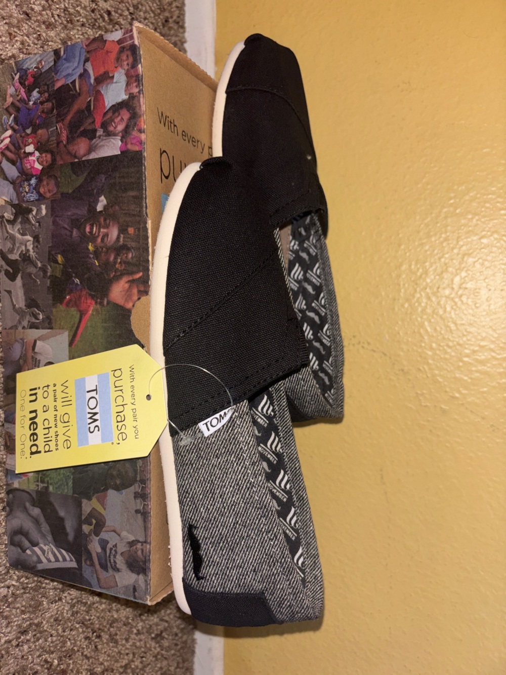 Toms Kids Black Canvas Slip-On Sneakers with Patterned Lining